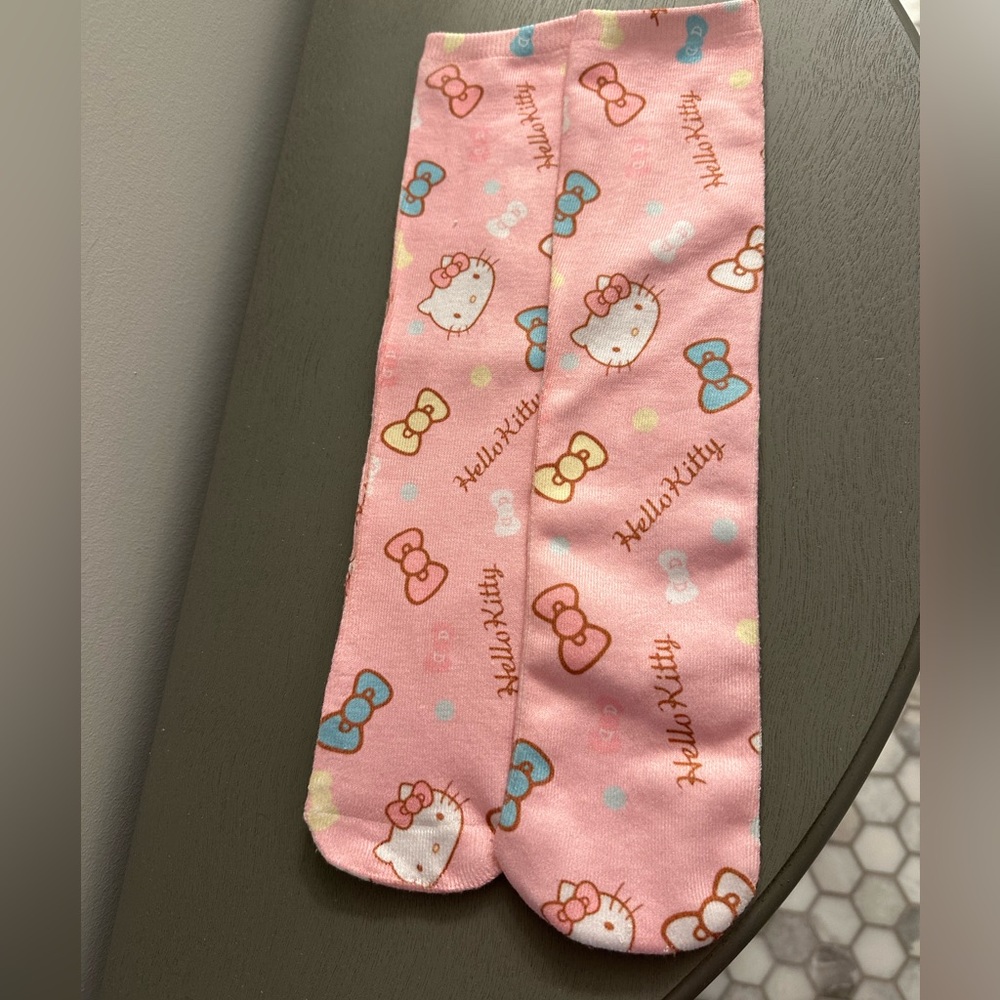 Pink Hello Kitty socks never worn